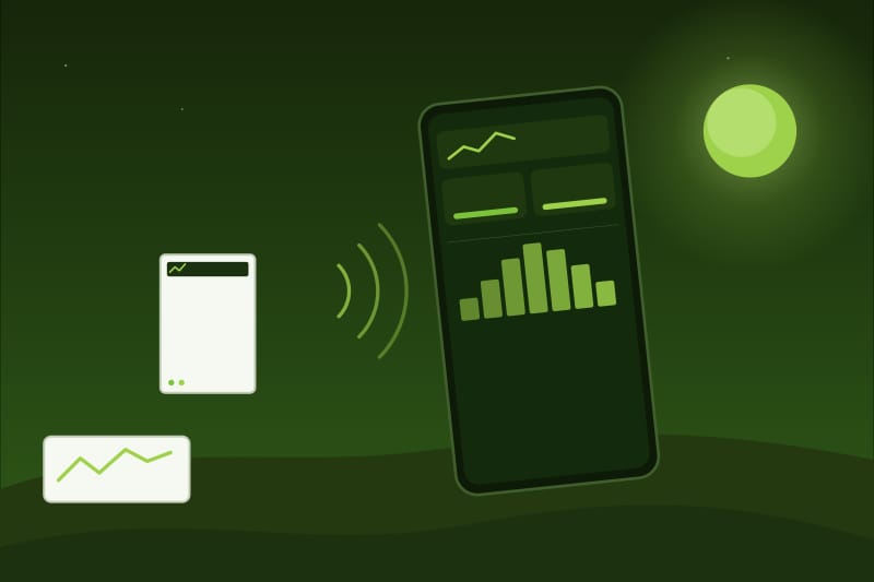 Un telefono con i grafici di produzione e consumo